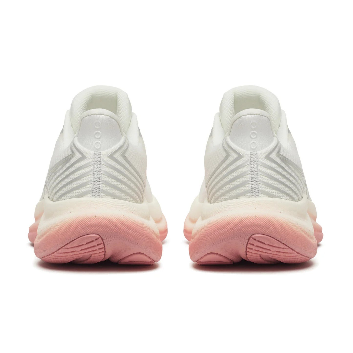 Back view of white Saucony running shoes with pink soles on a white background