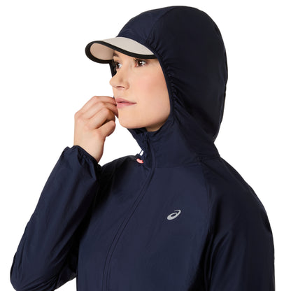 Person wearing a jacket with a hoodie on a white background 