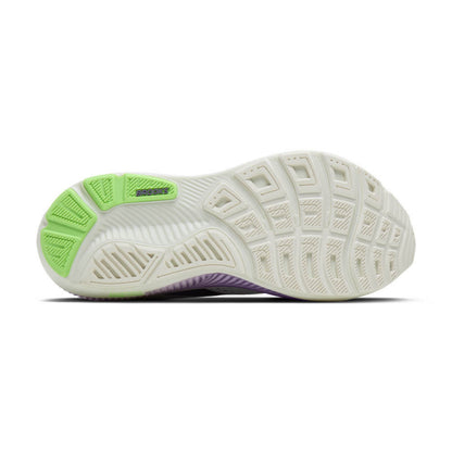 White Brooks running shoe sole with green and a tread pattern on a white background