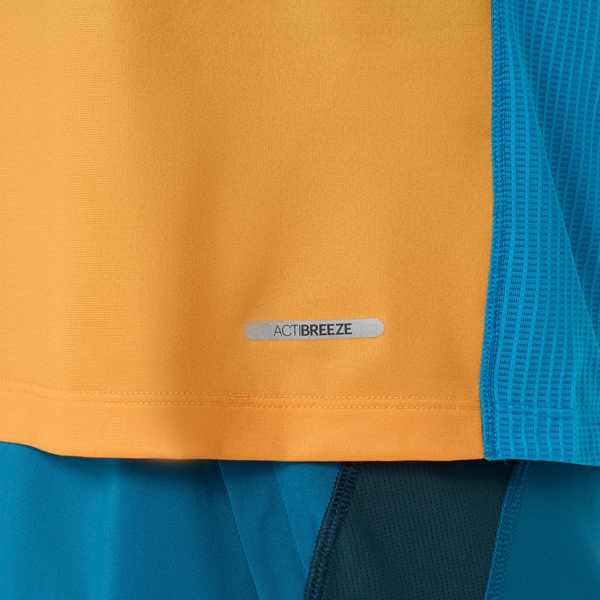 Close-up of a Asics running shirt with ActiBreeze branded 