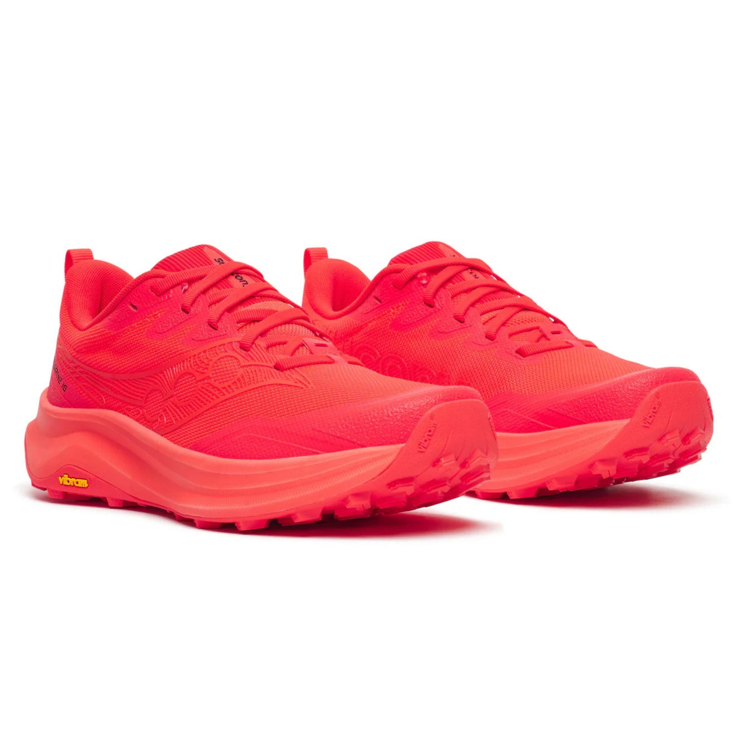 Pair of red Saucony running shoes on a white background