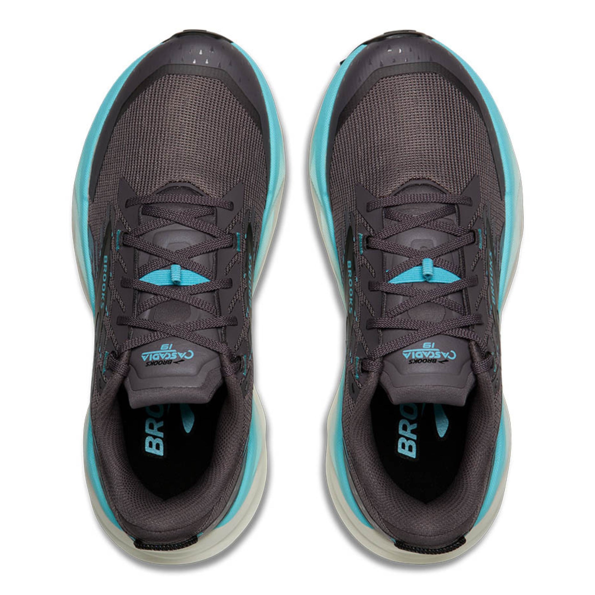 Pair of dark gray Brooks running shoes with teal accents on a white background