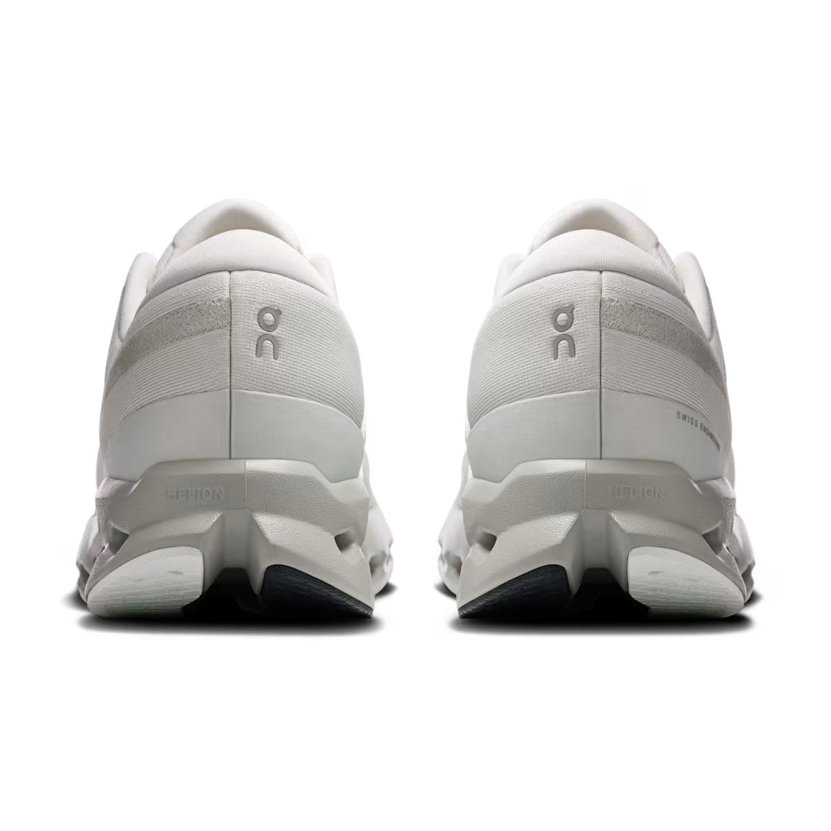 A pair of white On running shoes shown from the rear, featuring the 'on' logo on the heel and a chunky, sculpted white midsole and outsole.