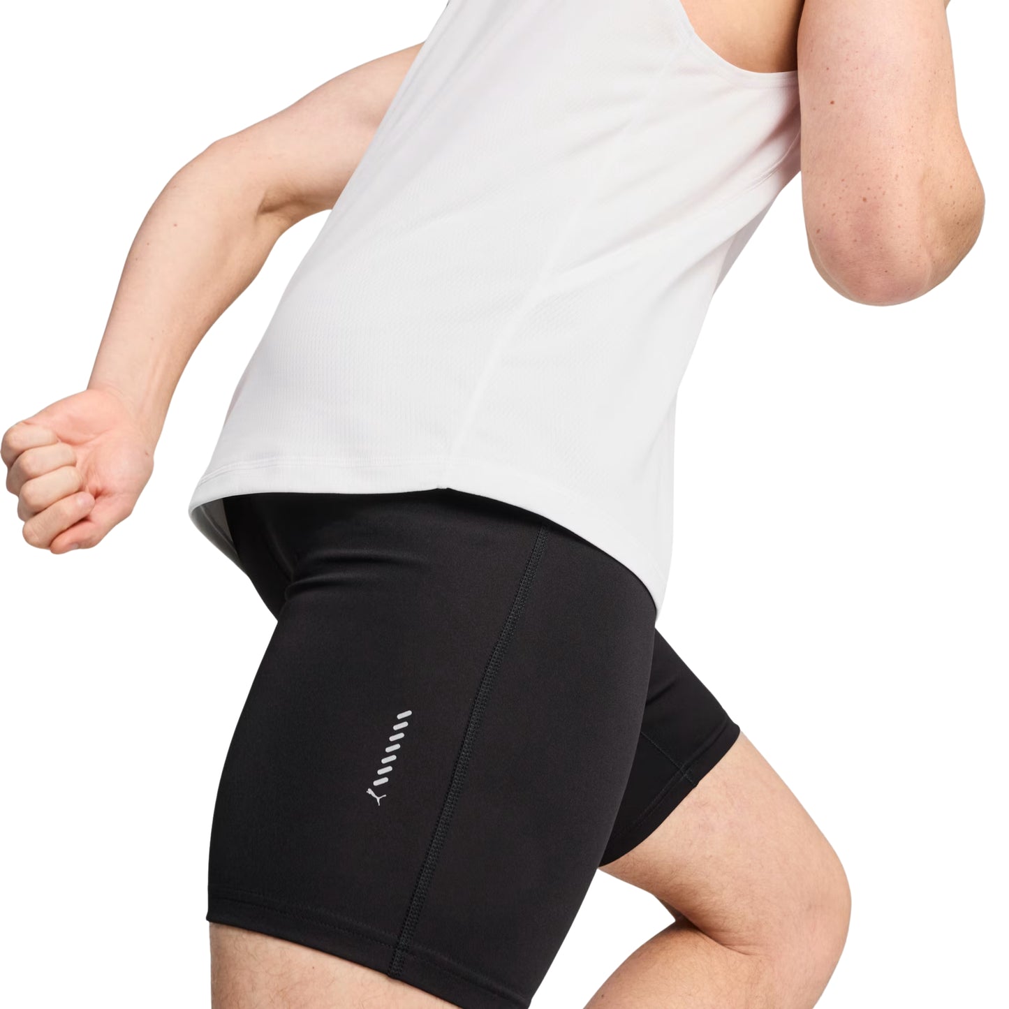 Person wearing black Puma tights with a brand logo on a white background