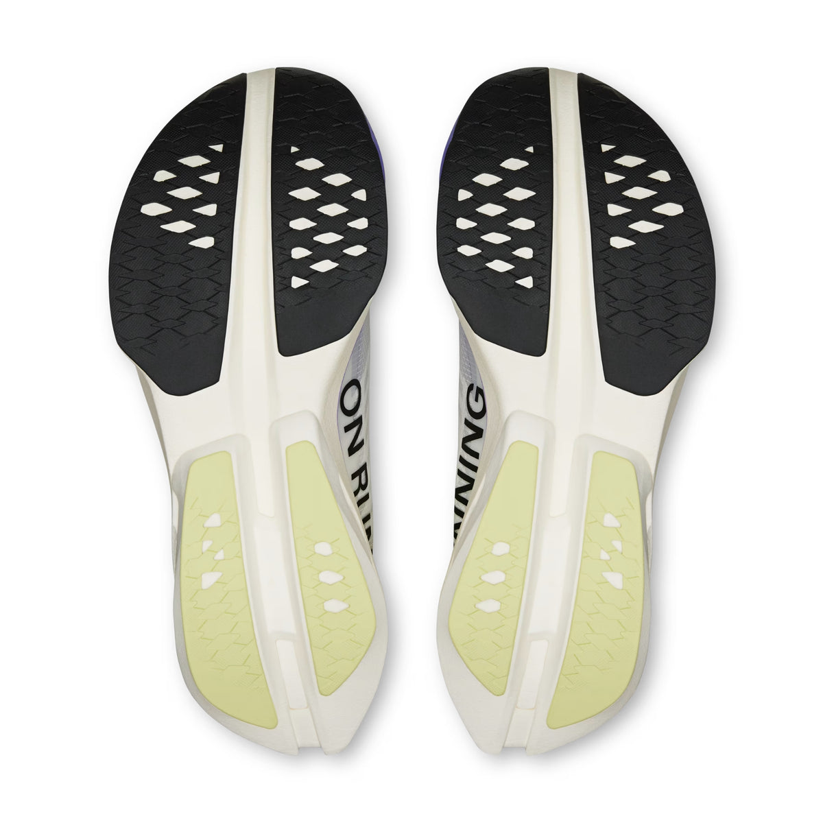 Top-down view of a pair of On running shoe soles, showing a white and black tread pattern with pale yellow-green cushioning areas and the partial text 'ON RUNNING".