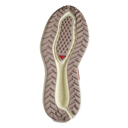 Close-up of a shoe sole with tread pattern on a white background