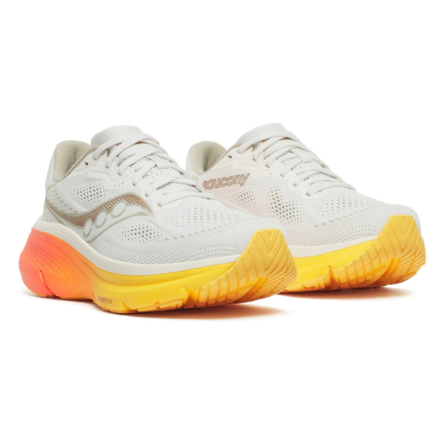 White Saucony running shoes with orange and yellow sole on a white background