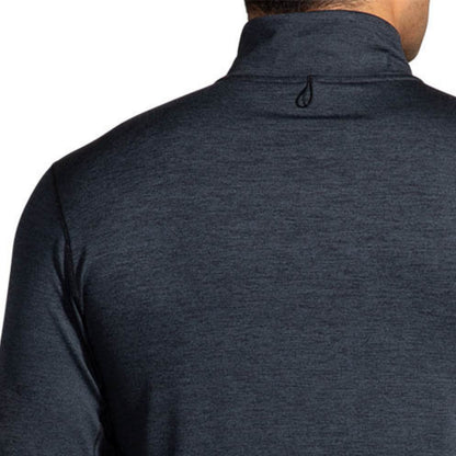 Close-up of a man wearing a long sleeve jersey on a white background
