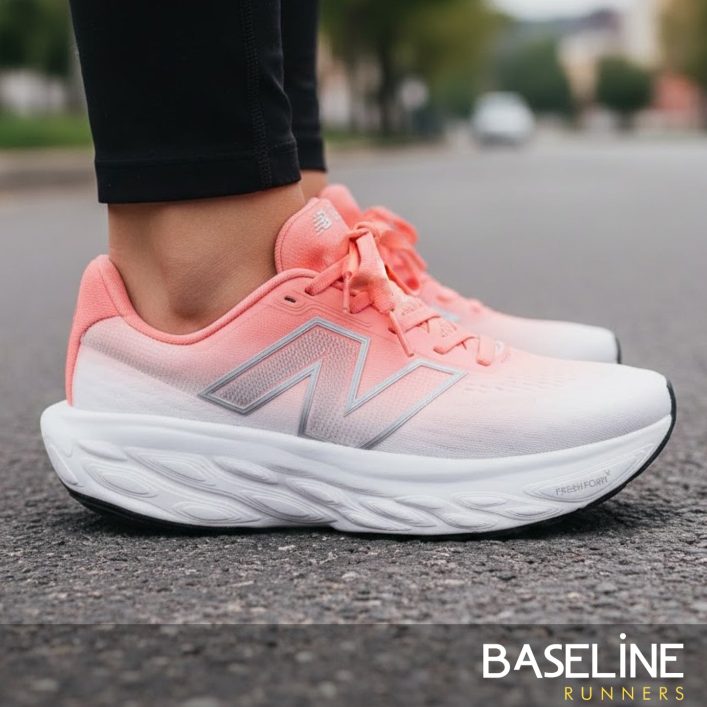 Red and white running shoes on a road with 'Baseline Runners' branding.