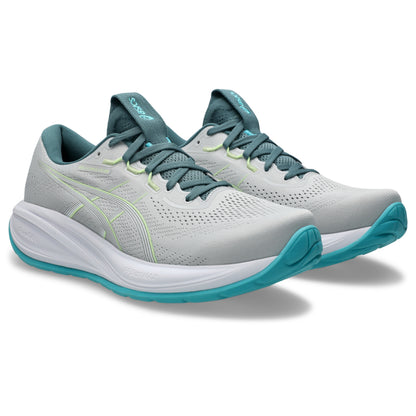 Gray and teal Asics running shoes on a white background
