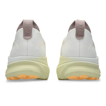 White Asics running shoes with orange accents on a white background