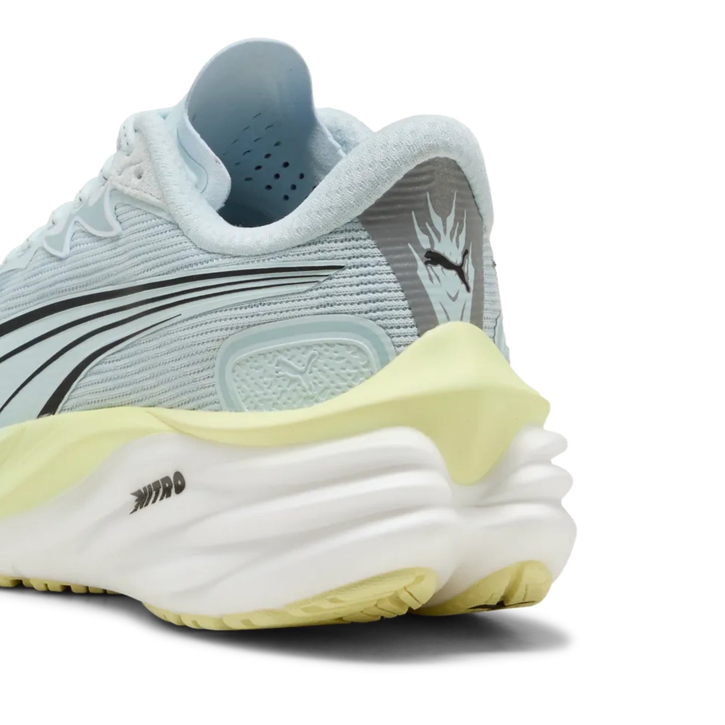 Light blue running shoe with yellow sole on a white background