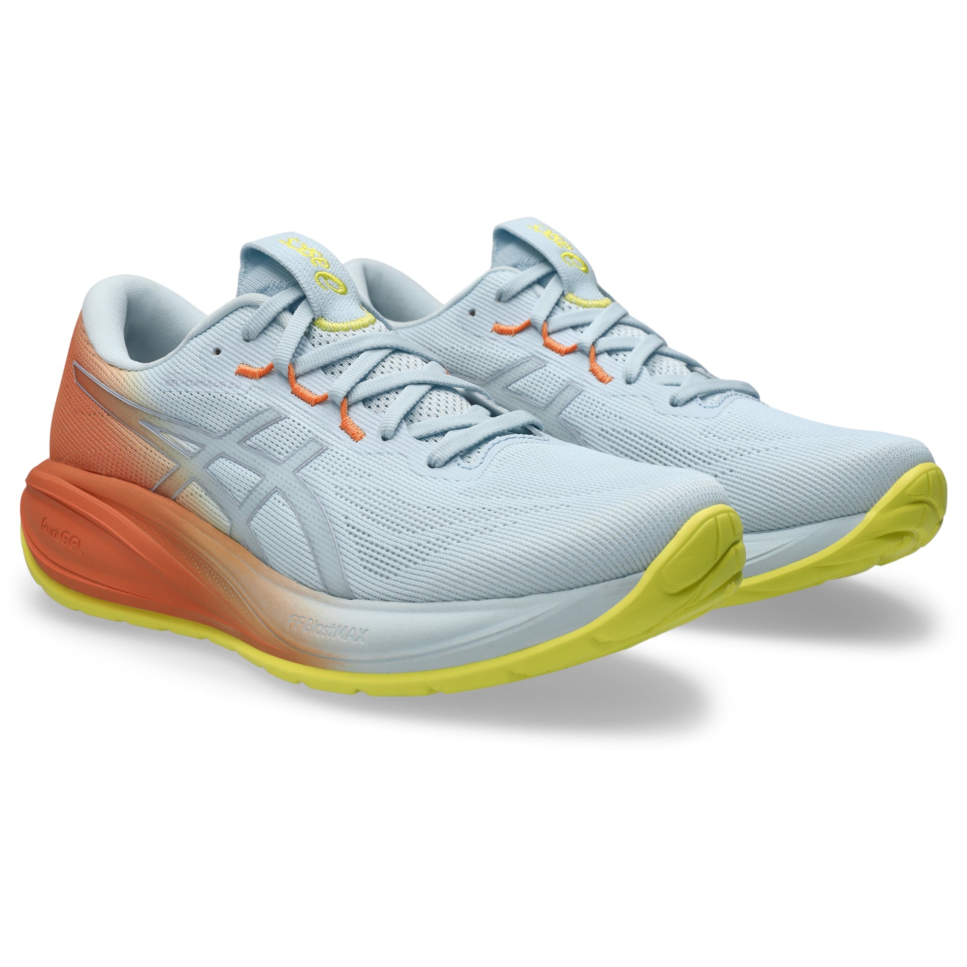 Pair of White and orange Asics running shoe with yellow accents on a white background