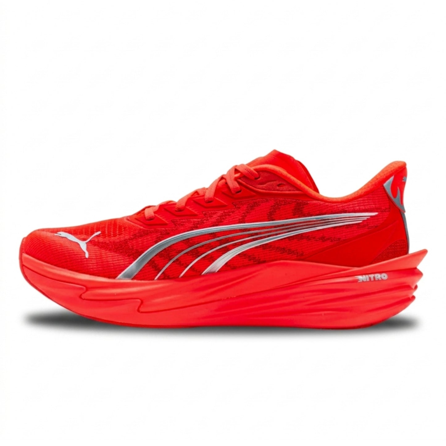 Red Puma running shoe with a white logo on a white background