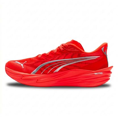 Red Puma running shoe with a white logo on a white background