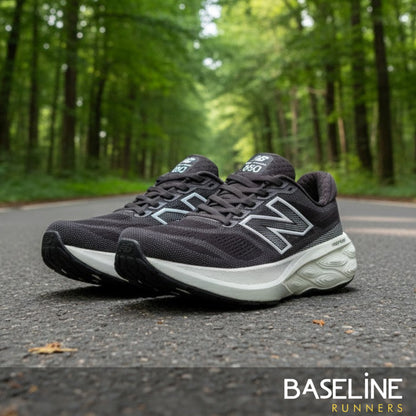 Black running shoes on a road with greenery in the background, featuring the 'Baseline Runners' brand.