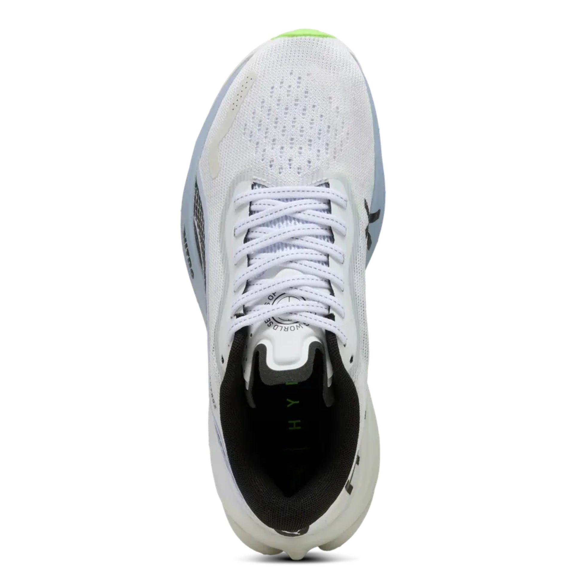 White Puma running shoe with black sole on a white background