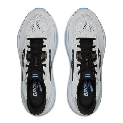 A pair of Brooks running shoes shown from a top-down view on a solid white background. The shoes are primarily white with black laces, black collar lining, and light blue accents on the logo and midsole.