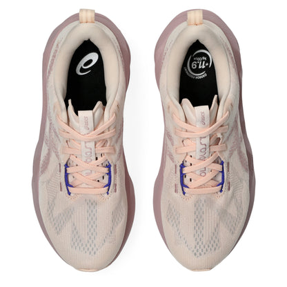 Pink Asics running shoes on a white background