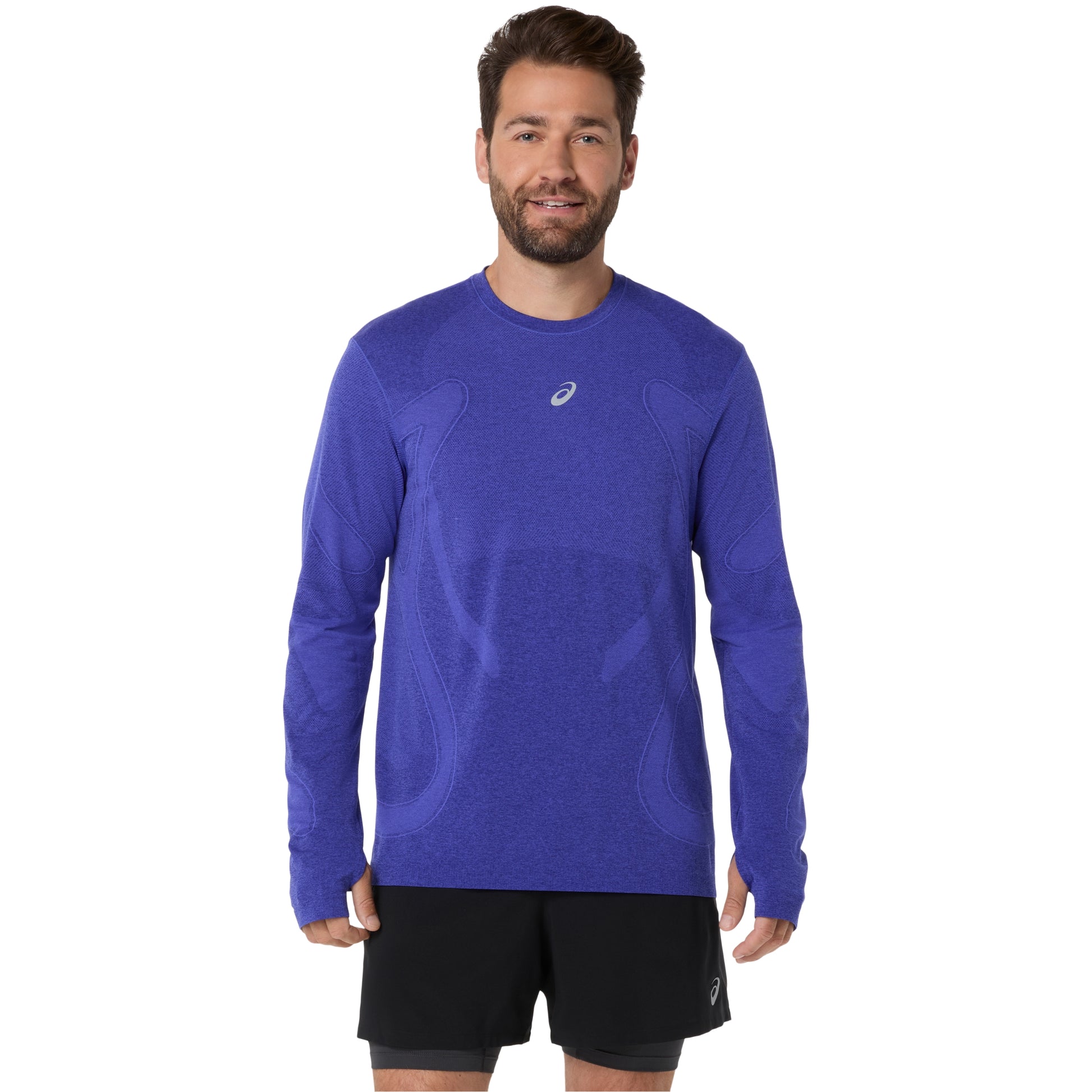 Man wearing a blue long-sleeve athletic shirt with a visible brand logo on a white background