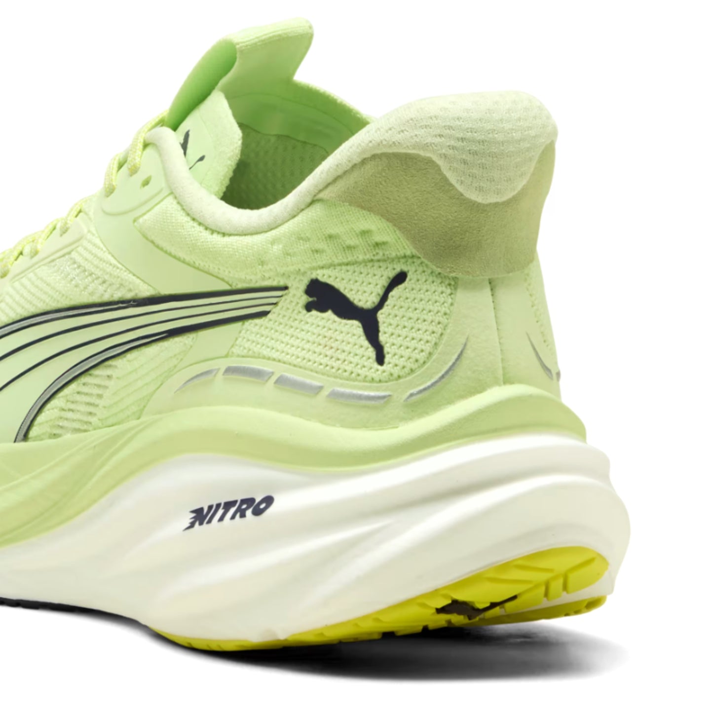 Light green running shoe with Puma logo on a white background