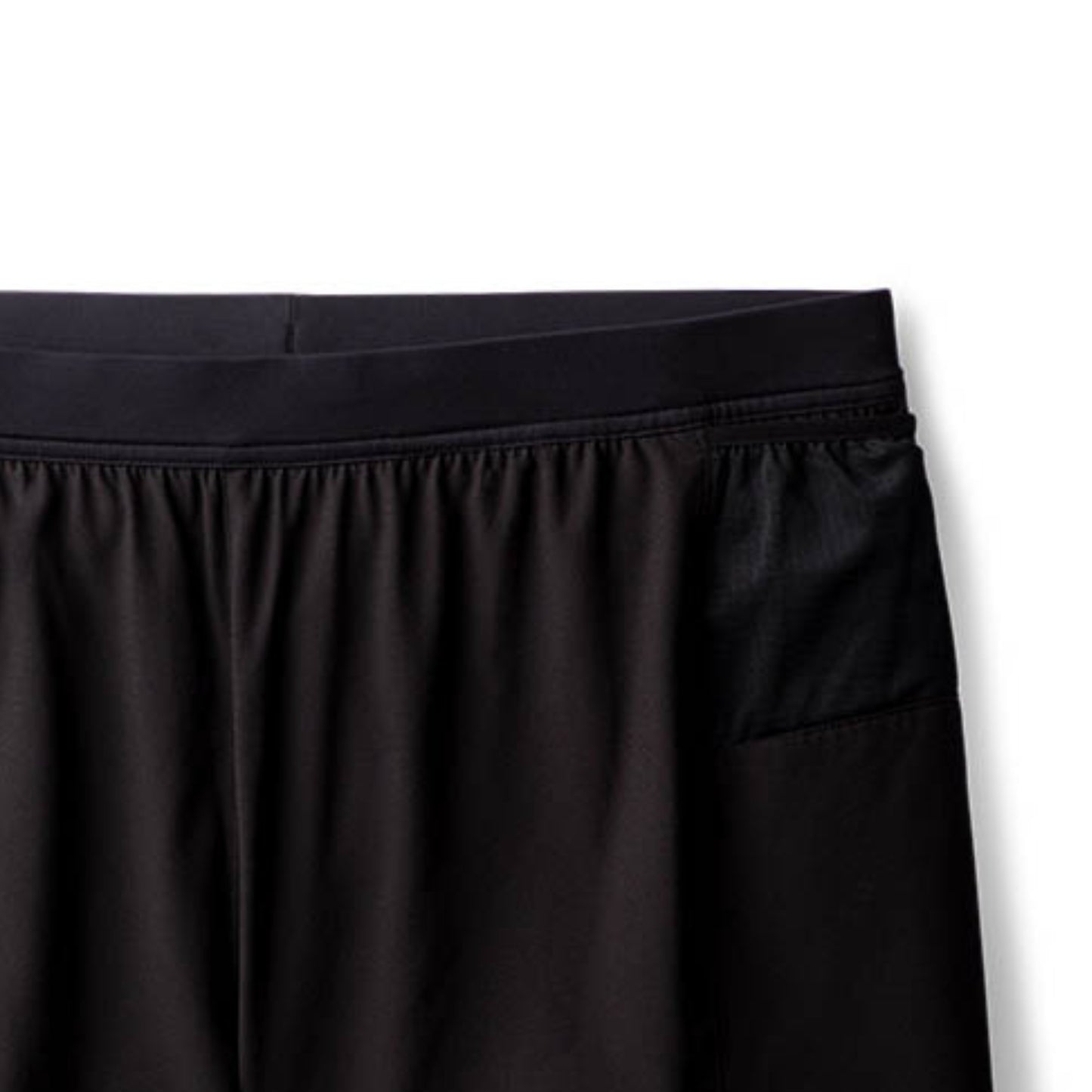 Close-up of a black running shorts on a white background