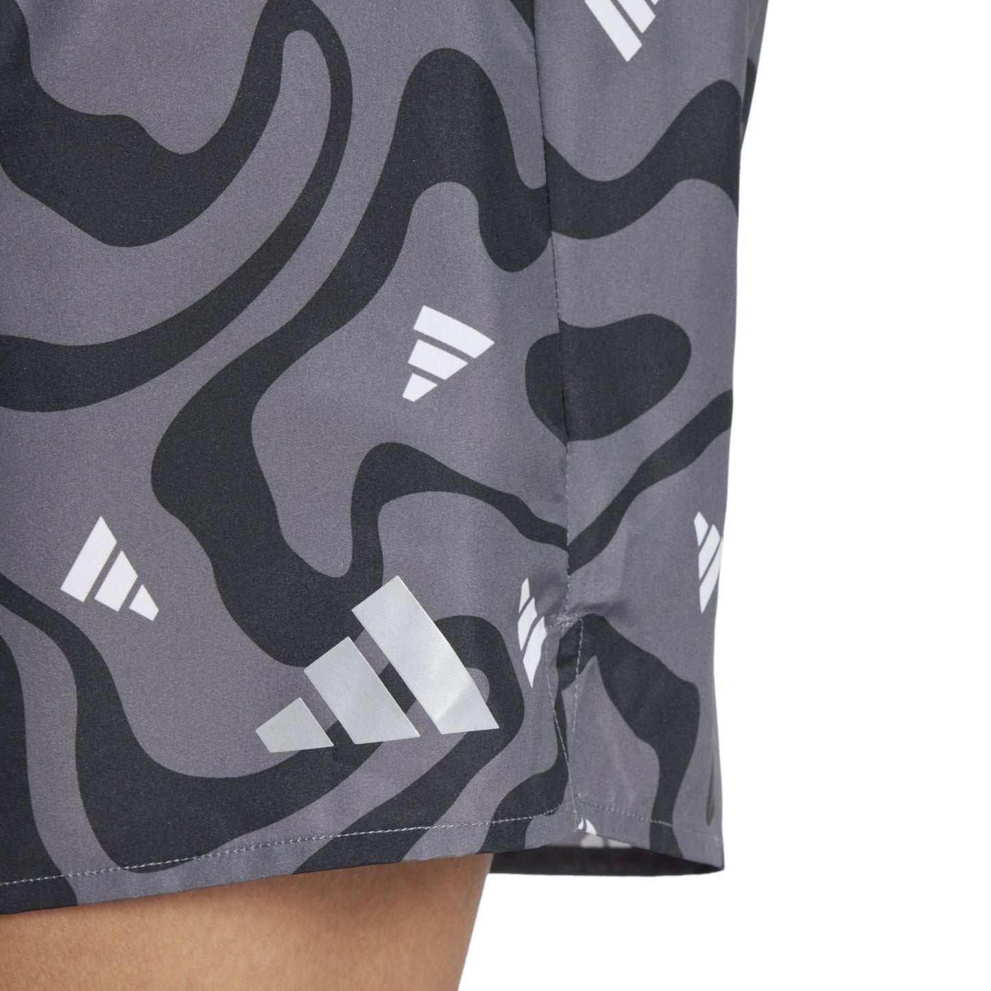 Man wearing Adidas grey patterned short 