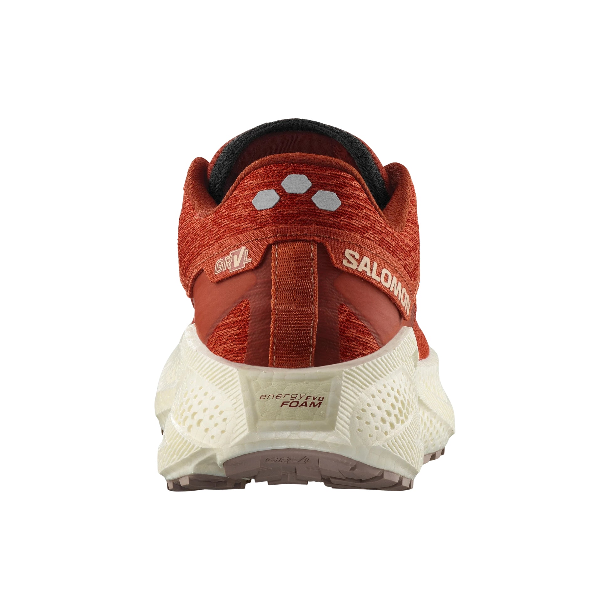 Red Salomon running shoe with white sole on a white background