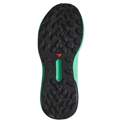 Close-up of a running shoe sole with a textured pattern on a white background