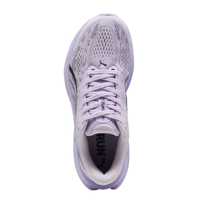A single Puma running shoe shown from a top-down view, featuring a light lavender and white mesh upper with matching laces and a dark gray Puma cat logo on the side.