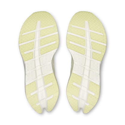 Top-down view of a pair of On running shoes showing their light yellow and white sole patterns against a white background.