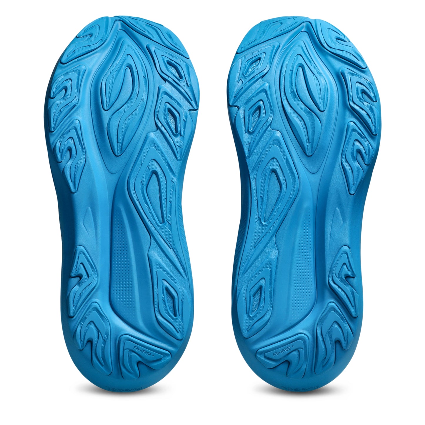 Blue shoe sole with textured pattern on a white background