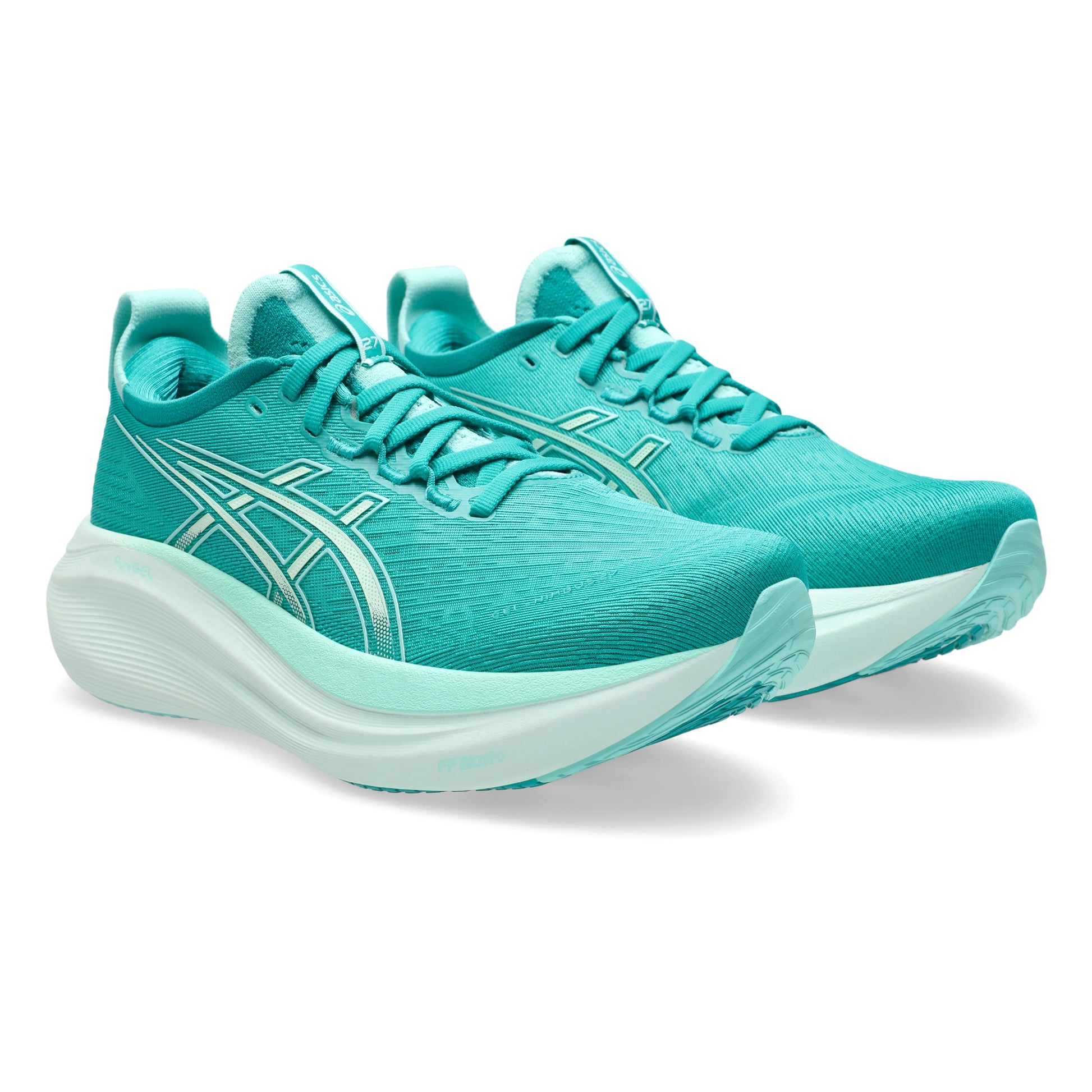 Teal running shoes with white accents on a white background