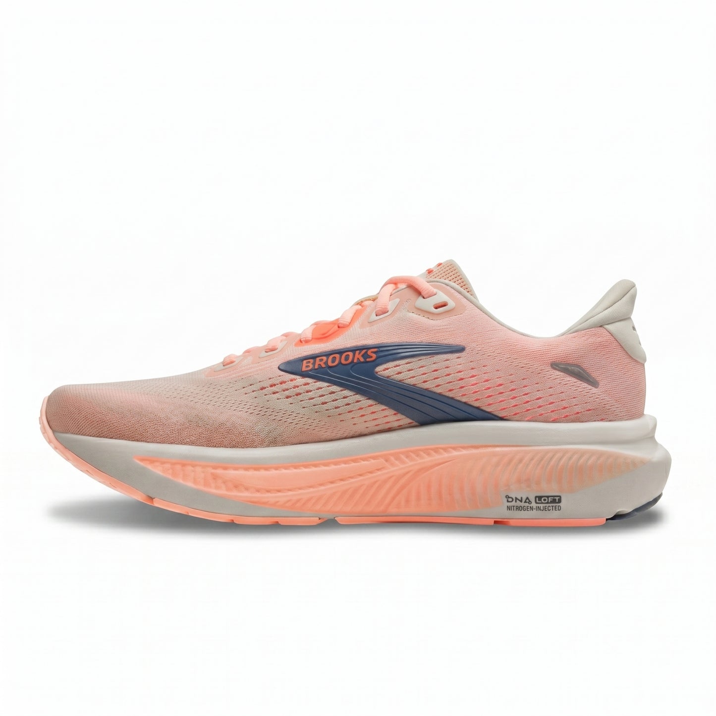 Brooks Ghost running shoe in a light peach-pink and coral colorway with a gray blue Brooks logo on the side, set against a plain white background.