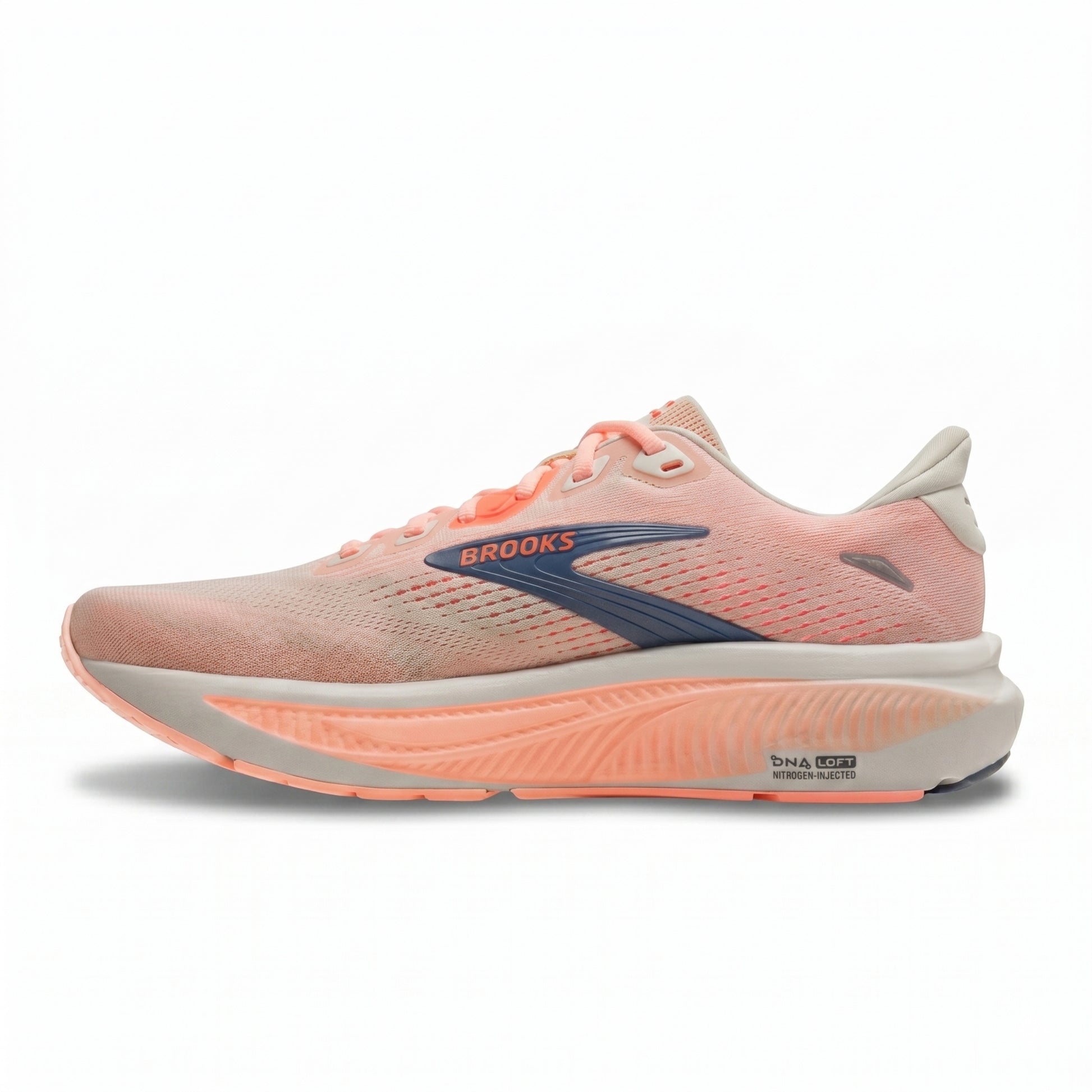 Brooks Ghost running shoe in a light peach-pink and coral colorway with a gray blue Brooks logo on the side, set against a plain white background.