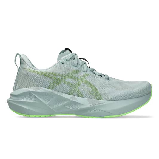 Light blue running Asics shoe with green sole on a white background