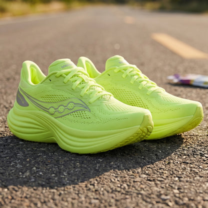 Neon green Saucony running shoes on a road