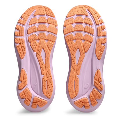 Close-up of a pair of shoes with orange sole pattern on a white background