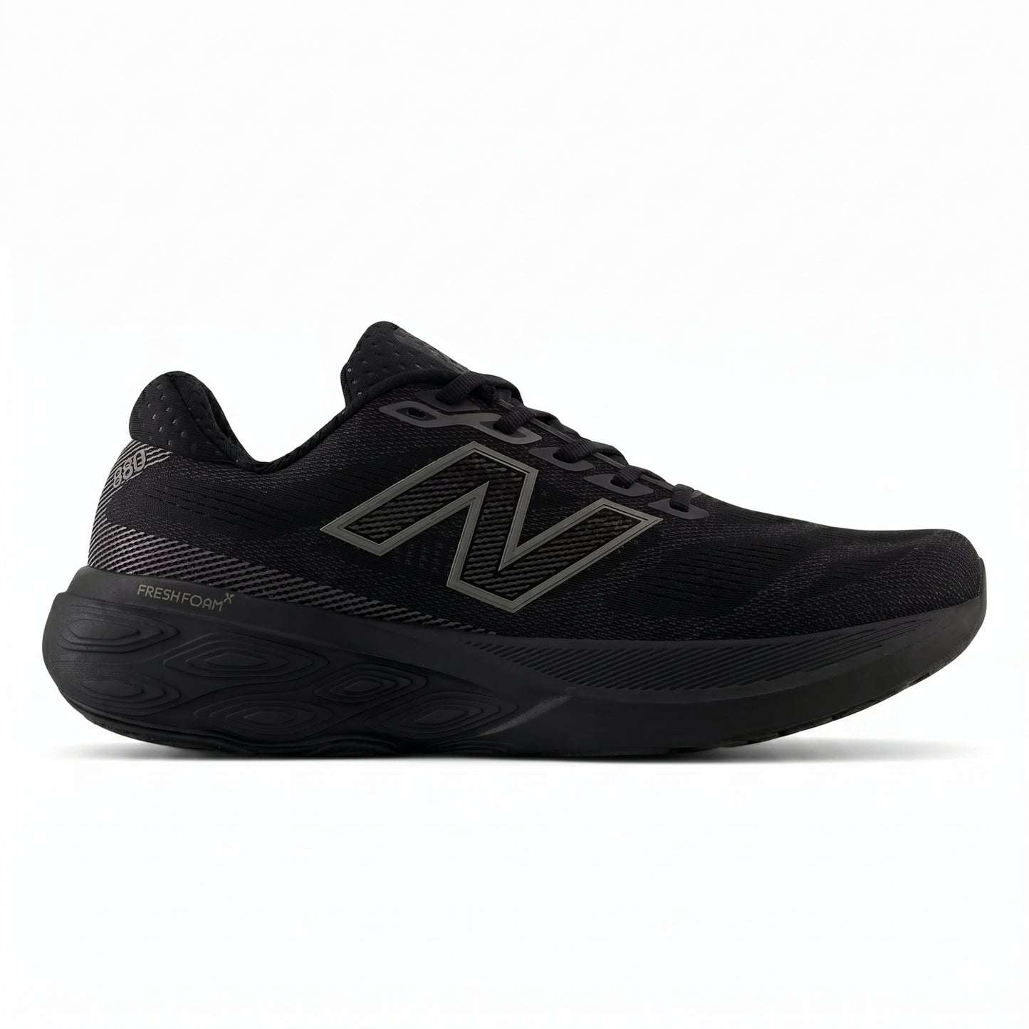 Black New Balance running with unique sole design on a white background