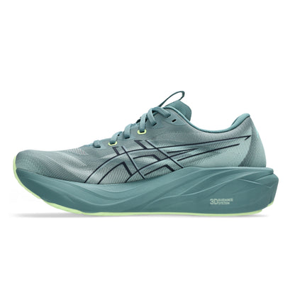 A single Asics running shoe in a muted teal-gray colorway, featuring a textured mesh upper, dark navy logo stripes, and a thick sculpted teal midsole with a small lime-green outsole accent, shown against a plain white background.