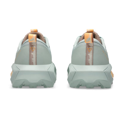 Asics running shoe with green and warm yellow tan accents 