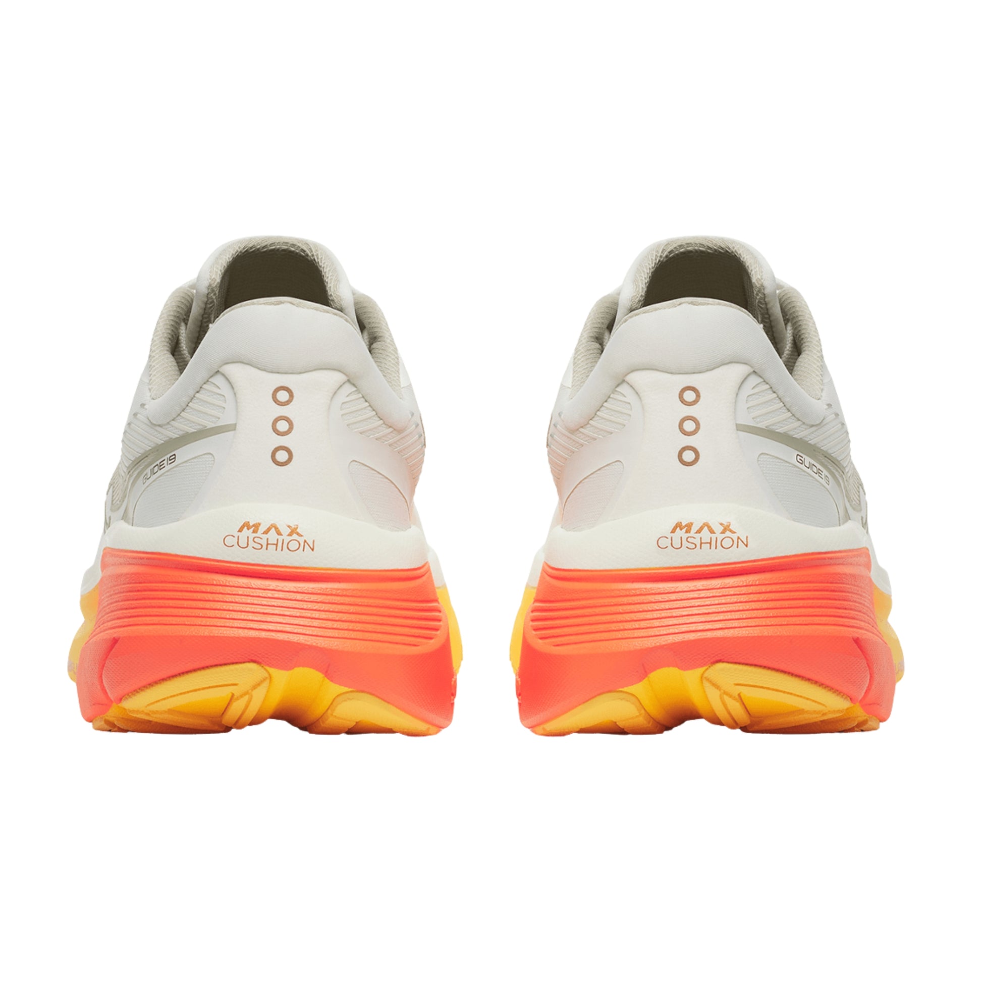 Pair of white Saucony running shoes with orange and yellow sole on a white background