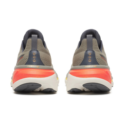 Pair of Saucony running shoes showing sole design on a white background