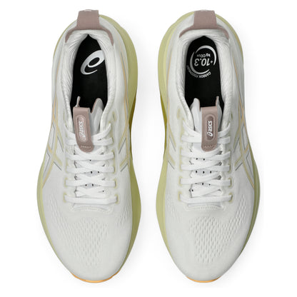 White Asics running shoes with beige accents on a white background