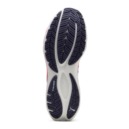 Blue and white Puma running shoe sole running shoe with tread pattern on a white background