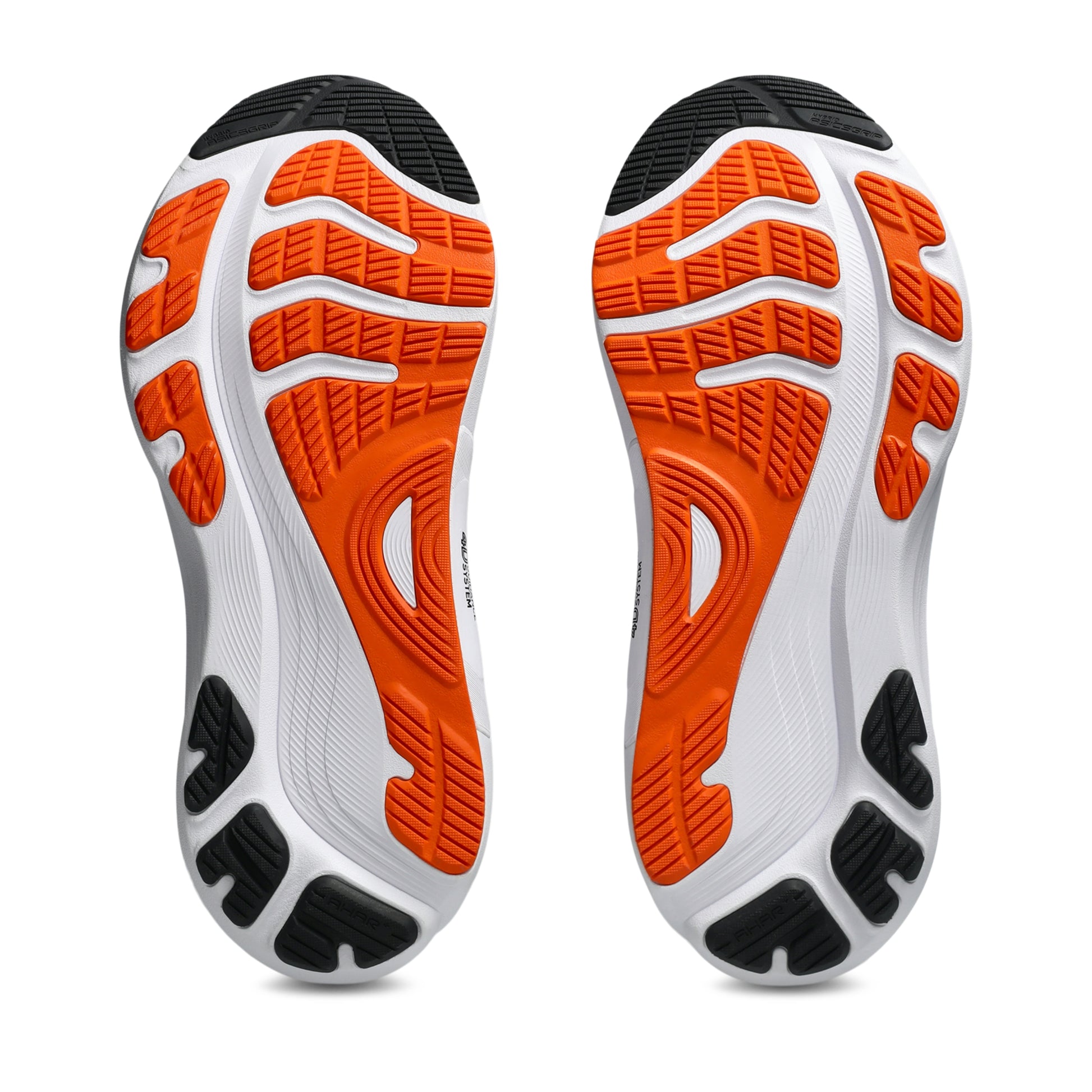 Close-up of a pair of running shoes with orange and black sole design on a white background