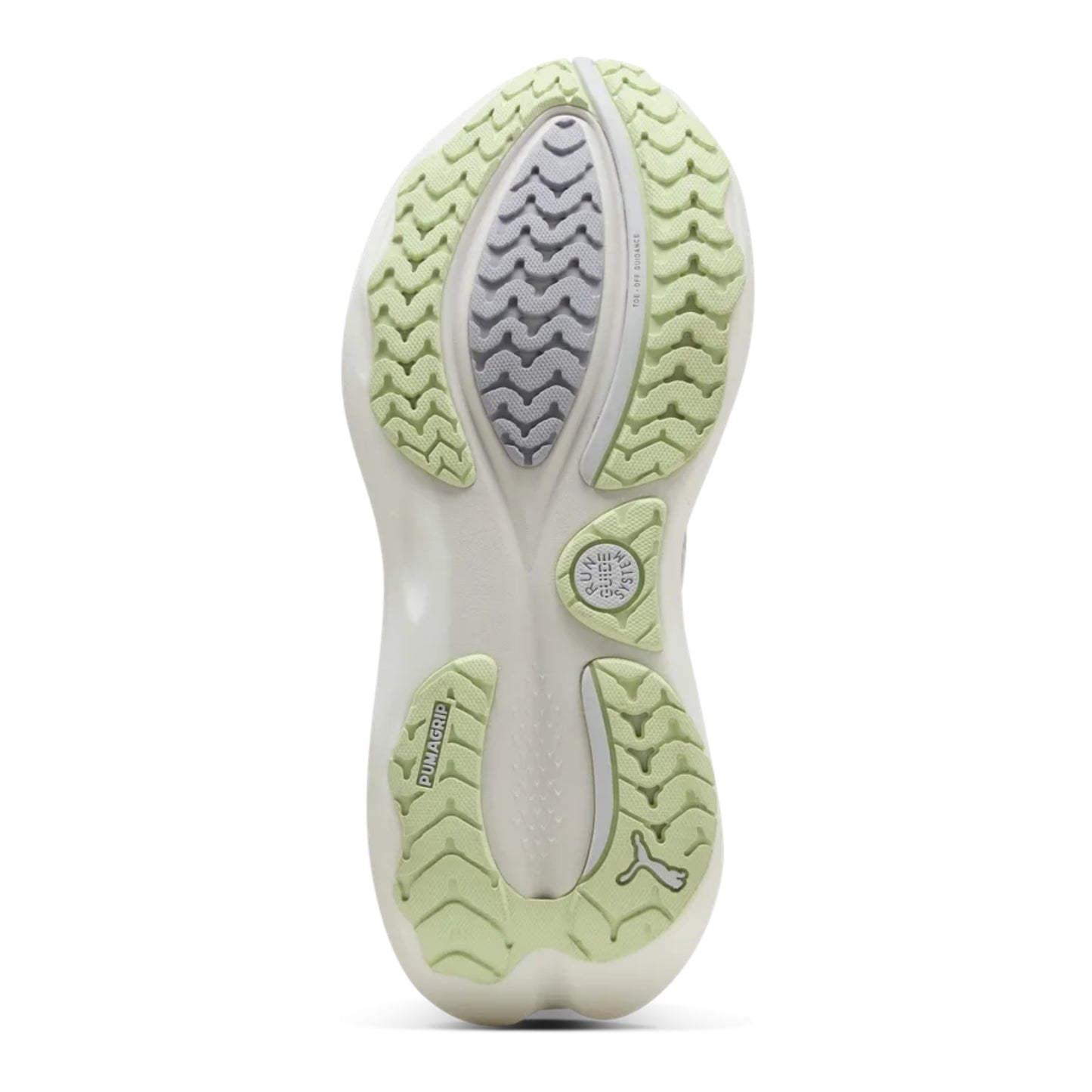 Close-up of a Puma running shoe sole with green and white design on a white background
