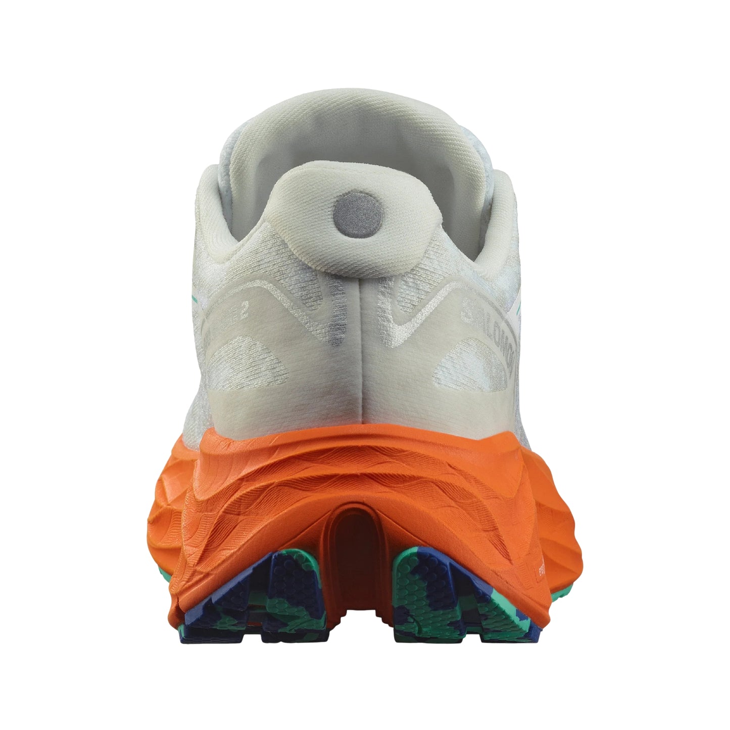 Back view of a shoe with orange sole and multicolored pattern on a white background