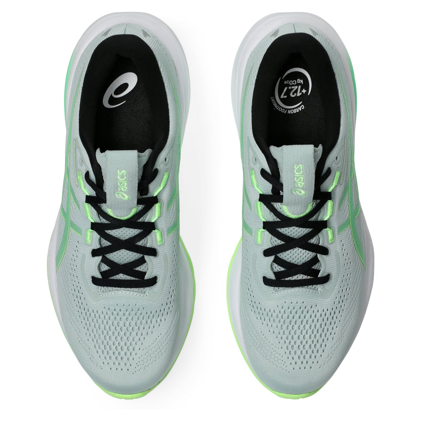 Light blue Asics running shoes with black and green accents on a white background