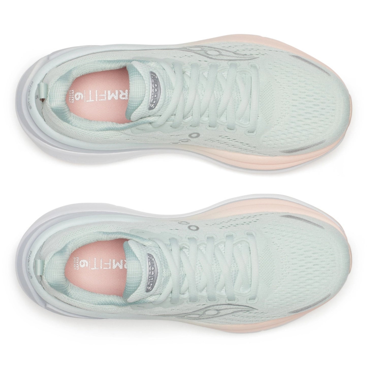Pair of light green Saucony running shoes with pink soles on a white background